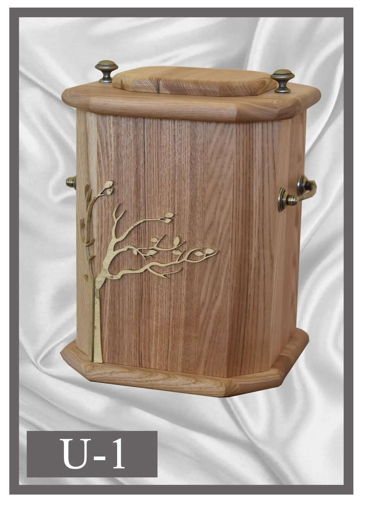 Wooden urn U1 faceted light wood design with a branch motif